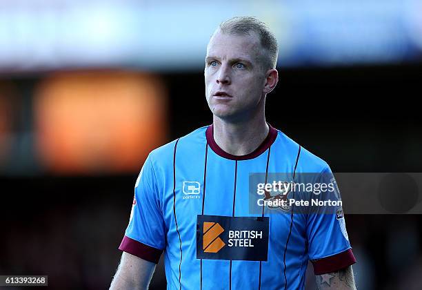 Neal Bishop of Scunthorpe United in action during the Sky Bet League One match between Scunthorpe United and Northampton Town at Glanford Park on...