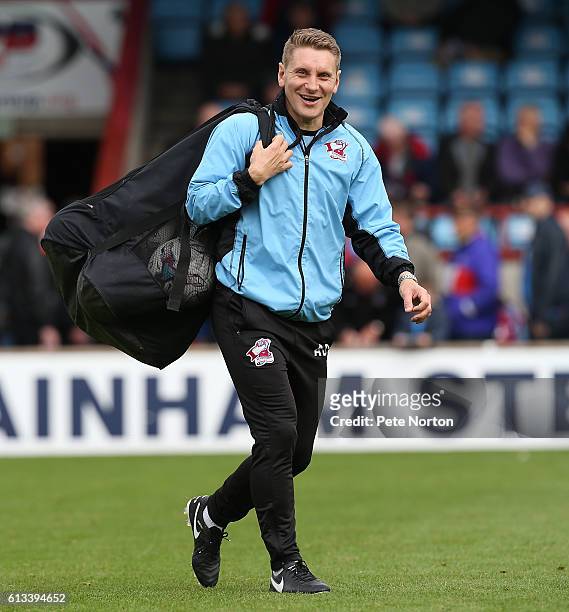 Scunthorpe United coach Andy Dawson walks from the pitch prior to the Sky Bet League One match between Scunthorpe United and Northampton Town at...