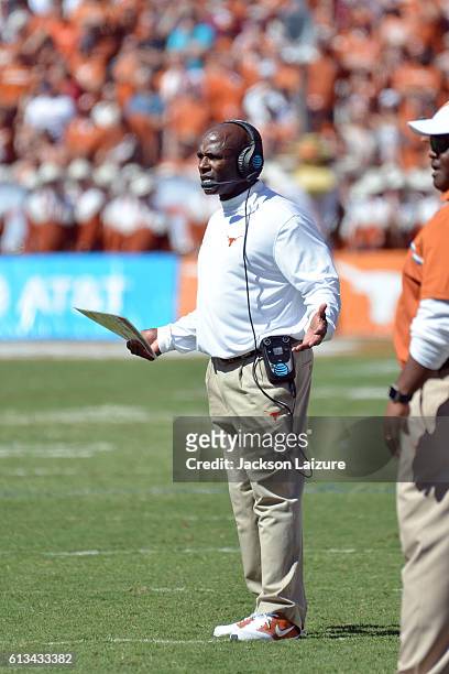 Head coach Charlie Strong of the Texas Longhorns reacts after his defense surrendered a touchdown during their loss to the Oklahoma Sooners on...