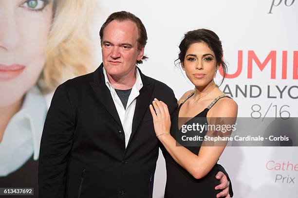 Director Quentin Tarantino and Daniella Pick attend the Opening Ceremony of the 8th Film Festival Lumiere on October 8, 2016 in Lyon, France.