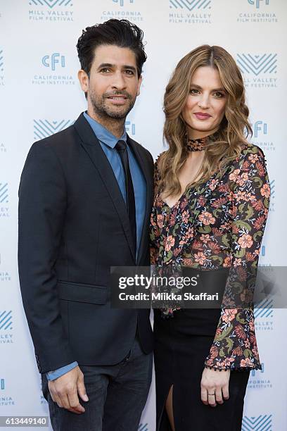 Actor Raza Jaffrey and actress Stana Katic arrive at the premiere of "The Rendevouz" at the 39th Mill Valley Film Festival at Cinearts @ Sequoia on...