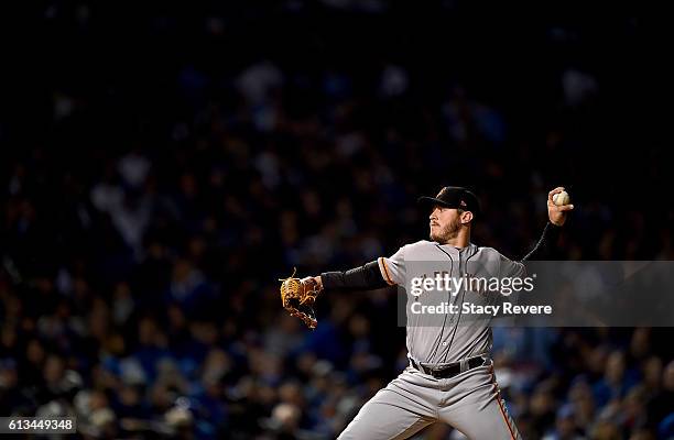 Ty Blach of the San Francisco Giants pitches in the fifth inning against the Chicago Cubs at Wrigley Field on October 8, 2016 in Chicago, Illinois.