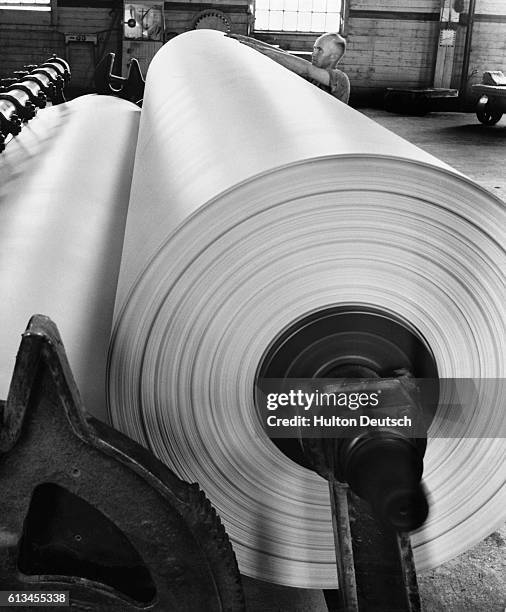 Giant roll of paper in a newspaper printing room on Fleet Street.