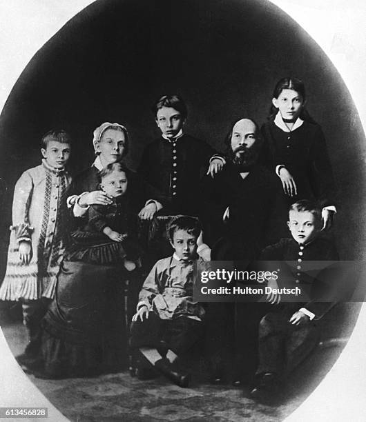 Vladimir Ilich Lenin as a boy with his family in his birthplace, Simbirsk, in 1879. Young Vladimir is seated on the lower right. | Location:...