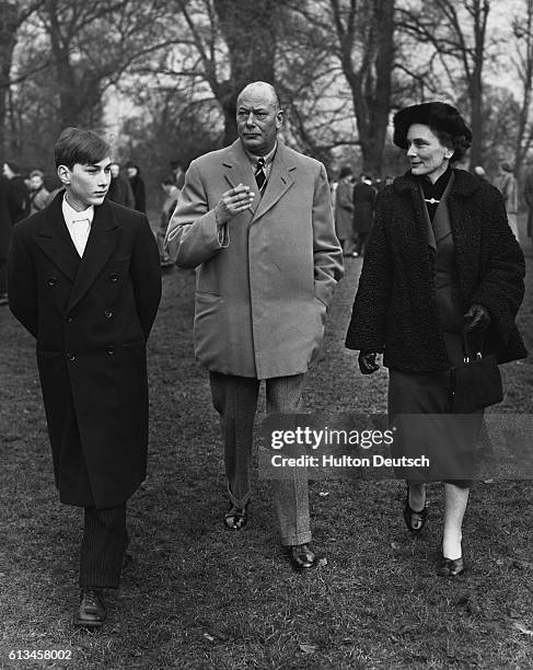 Henry and Alice, Duke and Duchess of Gloucester, with their son Prince William at Eton College on St Andrews Day.