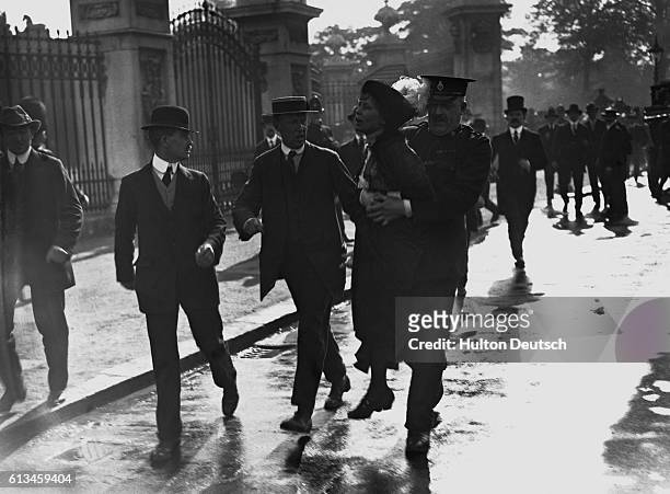 Original caption: Emmeline Pankhurst, Suffragette Leader, Arrested Outside Buckingham Palace.