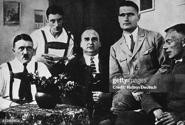 Adolf Hitler sits at a table with Maurice Kriebel, Rudolf Hess and Max Weber in prison at Landsberg Am Lech in 1924 after the failed Munich Beer Hall...