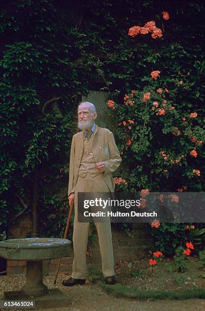 Irish dramatist George Bernard Shaw in a rose garden. His most famous plays include; Pygmalion , Saint Joan , The Devil's Disciple and Caesar and...