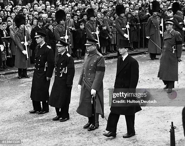 Members of the Royal Family follow the coffin during the funeral procession of Queen Mary, the wife of King George V of England. The procession is...
