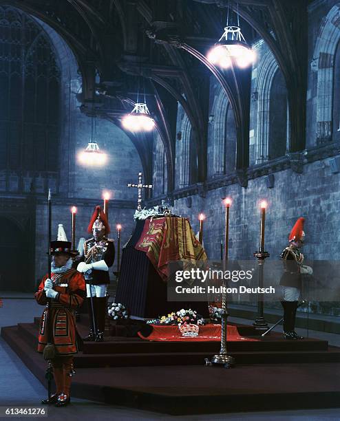 The late King George VI of England lies in state in the chapel at Windsor.