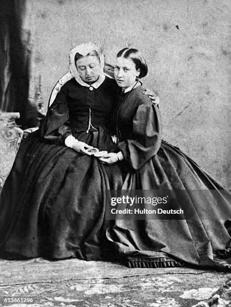 Queen Victoria of England and her daughter Princess Helena, who is her fifth child.