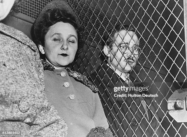 Condemned spy Julius Rosenberg sits manacled in a United States Marshal's van en route to the Federal House of Detention, New York. His wife Ethel...