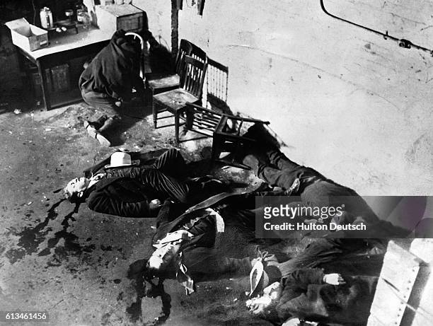 The aftermath of the Valentine's Day Massacre of February 14, 1929. Seven members of the O'Banion Moran gang were trapped in a garage, lined up...