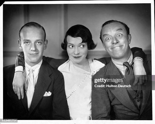 Adele Astaire stands in the middle of Fred Astaire and Leslie Hanson in the play Funny Face.