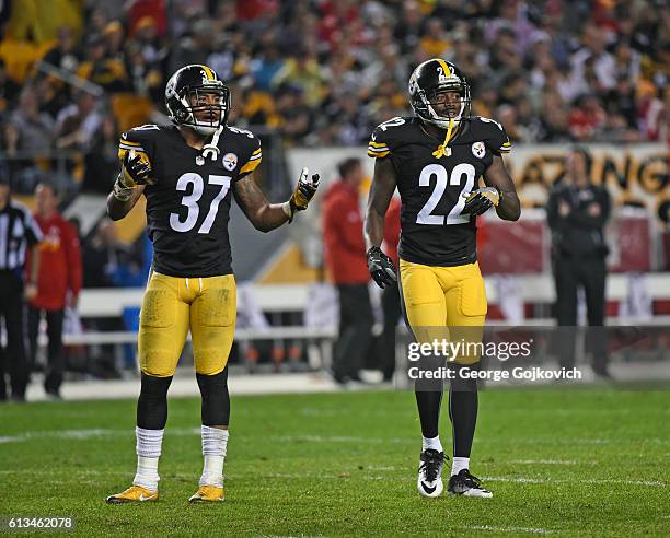 Safety Jordan Dangerfield and cornerback William Gay of the Pittsburgh Steelers look on from the field during a game against the Kansas City Chiefs...