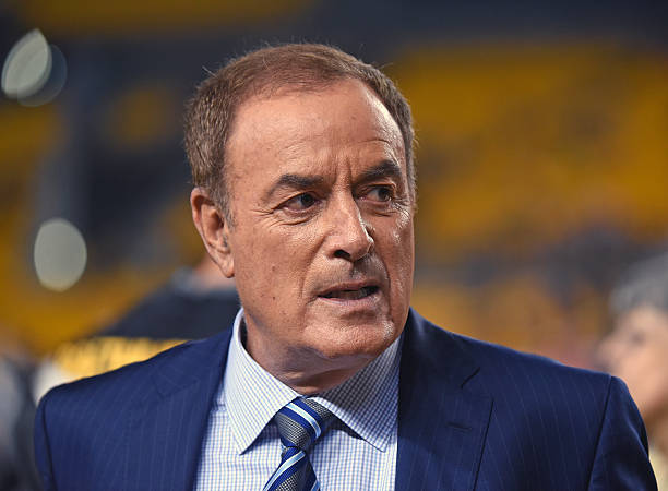 Al Michaels, NBC Sports Sunday Night Football announcer, looks on from the sideline before a game between the Kansas City Chiefs and Pittsburgh...