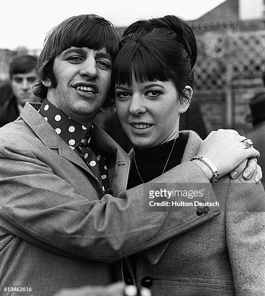 Ringo Starr, the Beatles drummer, hugs his new wife Maureen during their honeymoon in Hove.