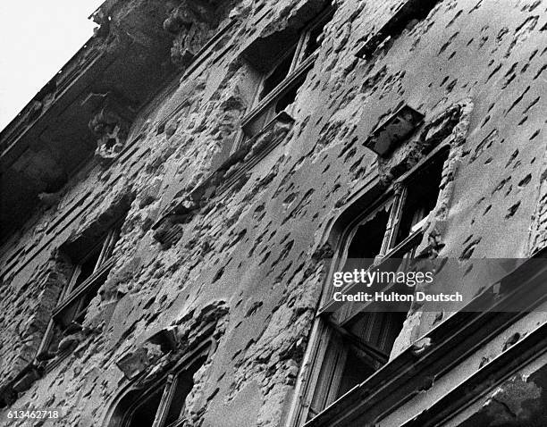 Hungarian building scarred with bullet holes during the 1956 uprising against the ruling communist regime.