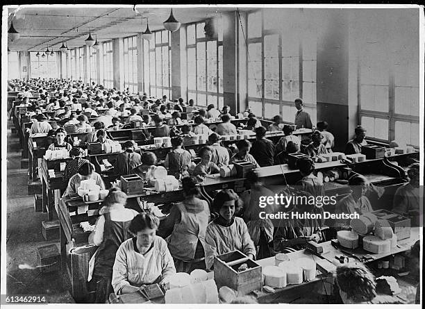 Female employees at work in a Berlin factory before the First World War.