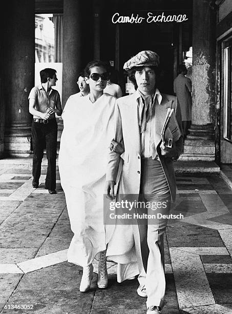 The lead singer of The Rolling Stones Mick Jagger with his wife Bianca during their honeymoon in Italy.