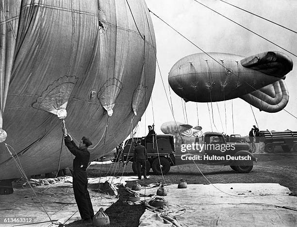 Blimp Inflating 57 White Blimp Stock Photos, High-Res Pictures, and Images - Getty Images