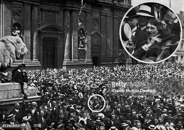 Adolf Hitler pictured in a large crowd attending a rally in Munich's Odeonsplatz, ca. 1914.