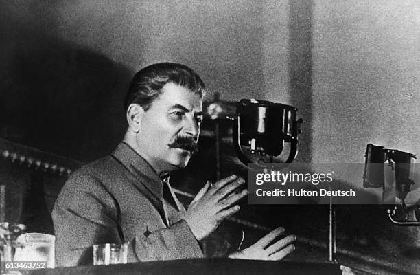 Soviet leader Joseph Stalin reports to the 8th All-Union Congress of Soviets on the draft Constitution of the USSR.