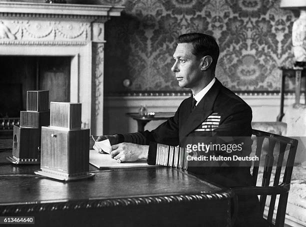 King George VI addresses the people of Britain and the British Empire live over BBC news radio networks at 6pm on Sunday 3rd September 1939, the day...