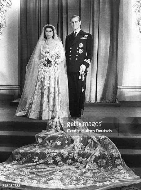 Princess Elizabeth and her husband Phillip, Duke of Edinburgh at Buckinham Palace after their marriage at Westminster Abbey, 1947.