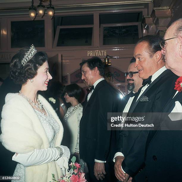 The Queen talks to the American entertainer Bob Hope at the 1967 Royal Variety Performance at the London Palladium.