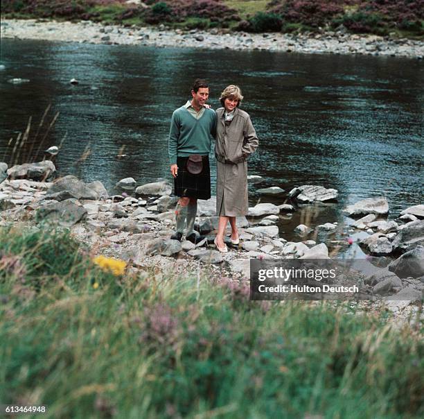 Charles and Diana, Prince and Princess of Wales, by the river at Balmoral after their honeymoon.