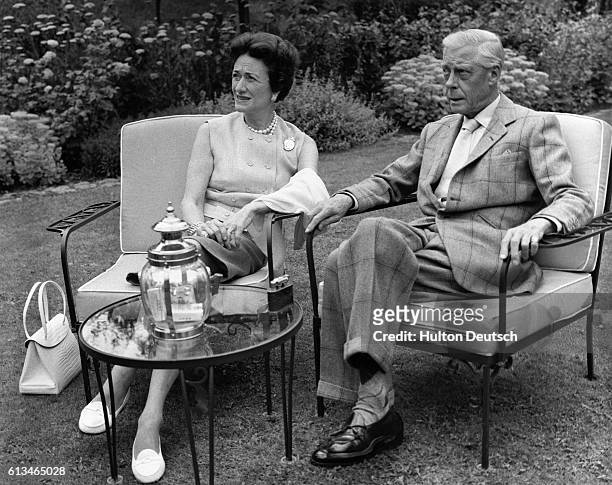 Wallis and Edward, Duke and Duchess of Windsor, in the garden of their country home, a converted mill in Gif-sur-Yvette. The Duke is the former King...