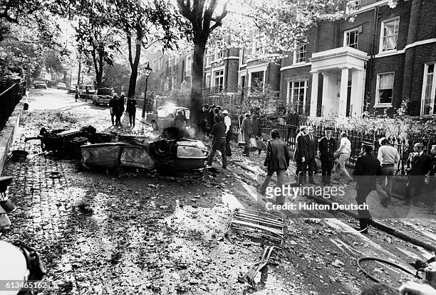 The wreckage of Mr. Fraser's car outside his house in Campden Hill Square, after the explosion of an IRA car bomb.