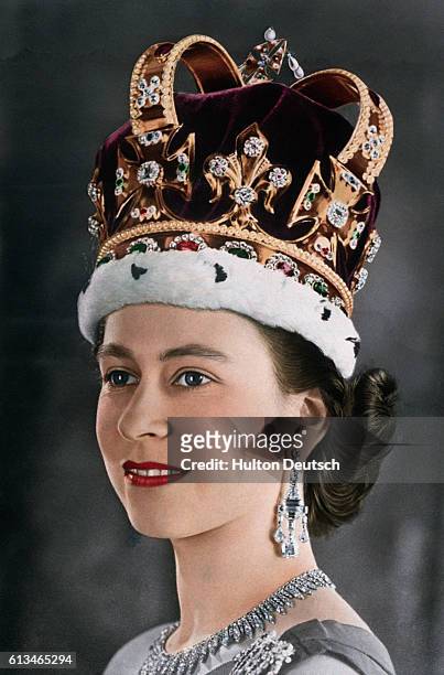 Portrait of young Elizabeth II of Great Britain and Northern Ireland, wearing the crown of the kings and queens of England for her coronation in June...