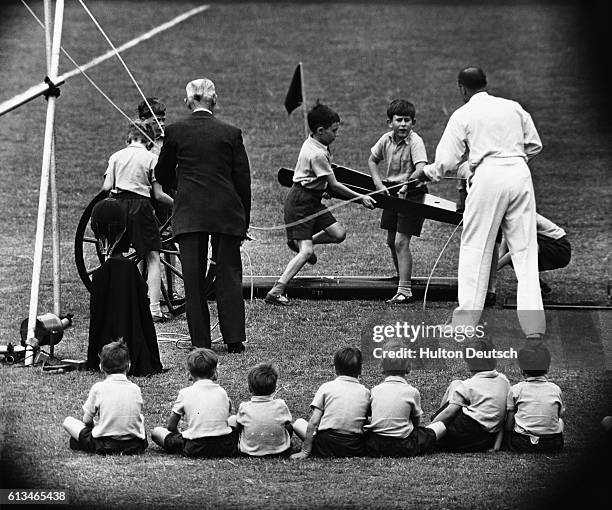 Prince Charles takes part in his school sports with fellow pupils.