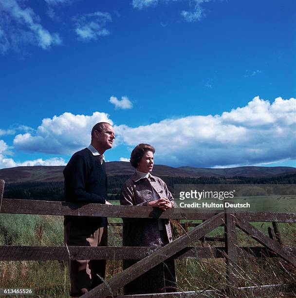 The Queen and Prince Phillip enjoy the scenery at Balmoral in Scotland.