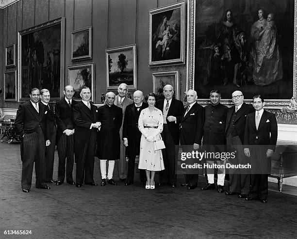 The Queen poses with the Dominion Prime Ministers of the Commonwealth, including the Chief Minister of Jamaica, Alexander Bustamente, after a...