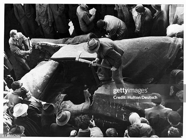 Statue Of Stalin Is Chopped Up The scene as the huge statue of Stalin is chopped to pieces - near the [National Theatre] Budapest - at the height of...