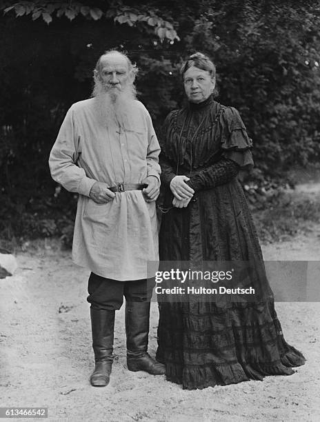 The Russian writer and philosopher Count Leo Tolstoy photographed with his wife Sonya in their garden, ca. 1906. | Location: Yasnaya Polyana, Russia.
