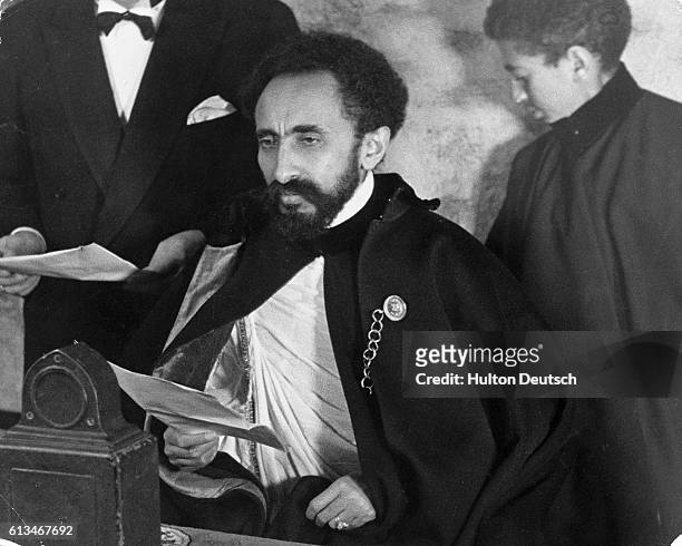 Haile Selassie, the Emporer of Abyssinia making a broadcast speech shortly before fleeing the capital Addis Ababa, after the Italian invasion and...