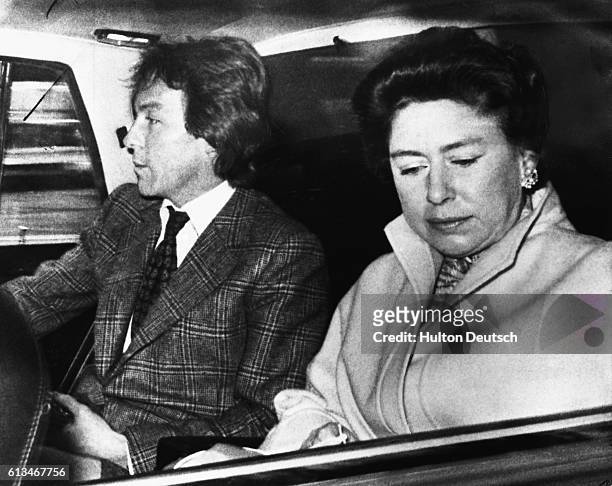 Princess Margaret and her companion Roddy Llewellyn on their way to Heathrow Airport before departing for a holiday in the Caribbean.