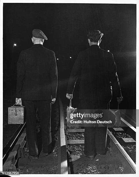 Rat catchers Charlie Jackson and Cliff Smoothy with three successful kills in the tunnels of the London Underground. They use ferrets and a net to...