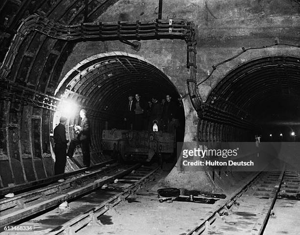 Workers prepare Bethnal Green Underground Station for the opening of a new Tube line between Liverpool Street and Stratford.