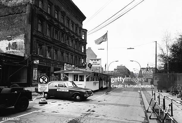 Checkpoint Charlie, the border crossing between East and West Berlin, seen from the western side.