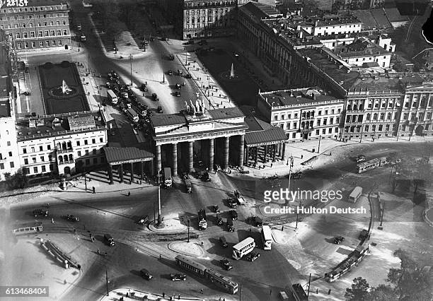 An aerial view of the Brandenburg Gate and the surrounding area.