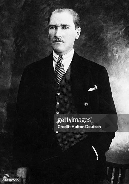 Kemal Ataturk poses in a suit for a portrait. Ataturk led the Turkish Nationalist Movement of 1909 and was the first President of Turkey after...
