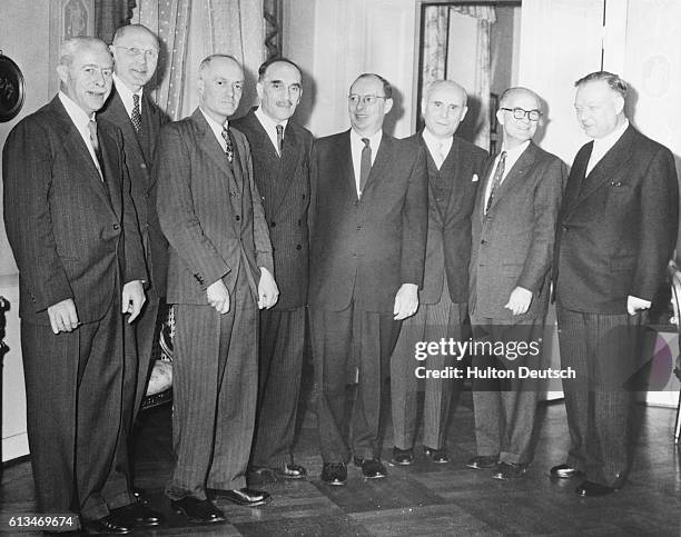 Walter Houser Brattain the American biochemist amongst a group at a reception in Stockholm for the nine Nobel Prize winners of 1956.