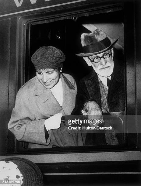 Psychoanalyst Sigmund Freud and his daughter and fellow psychoanalyst Anna Freud arrive in Paris in 1938, just after fleeing the Nazi occupation of...