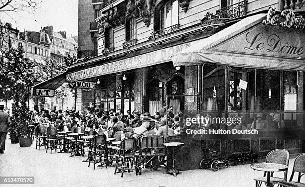 The busy open-air Le Dome cafe stands in the Montparnasse district of Paris, France.