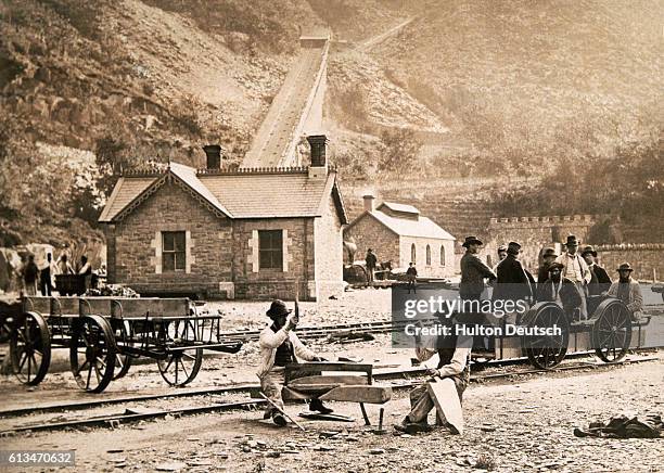 Men work at a slate quarry in Llanberis, Wales.
